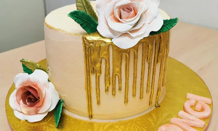 Choice of one or two-tiered drip cake from Bubbles Cups & Cakes