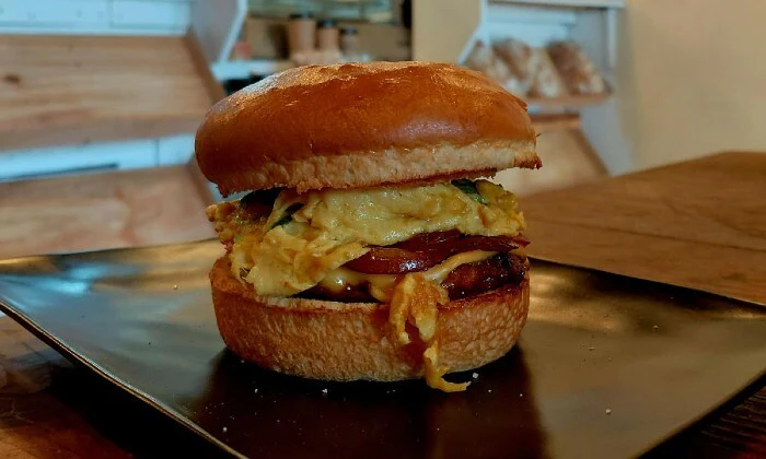 Hearty Smash Brekky Bun & Iced Latte Combo for 2 at Café Culcha, Sea Point - Image 6